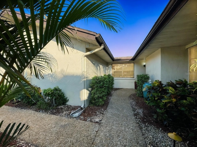 view of property exterior at dusk