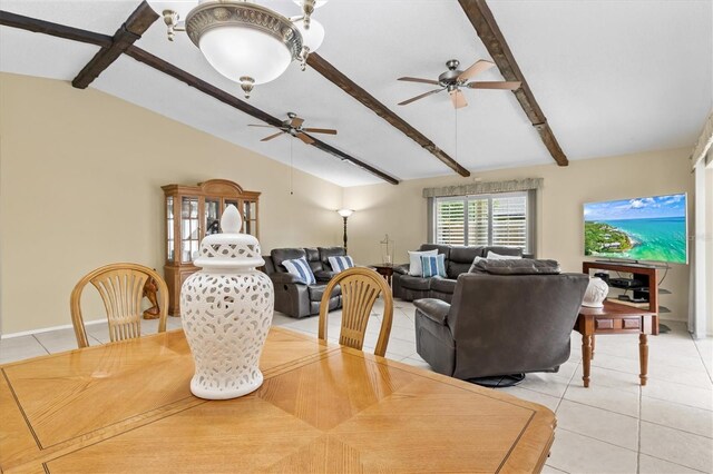 tiled dining room featuring vaulted ceiling with beams and ceiling fan