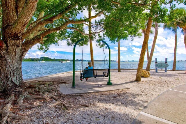 property view of water featuring a beach view