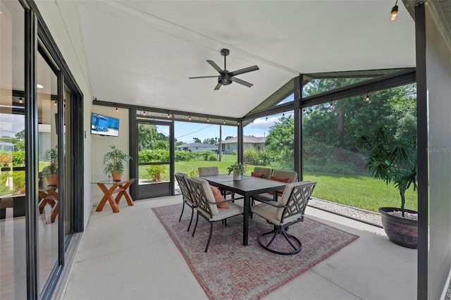 sunroom with vaulted ceiling and ceiling fan