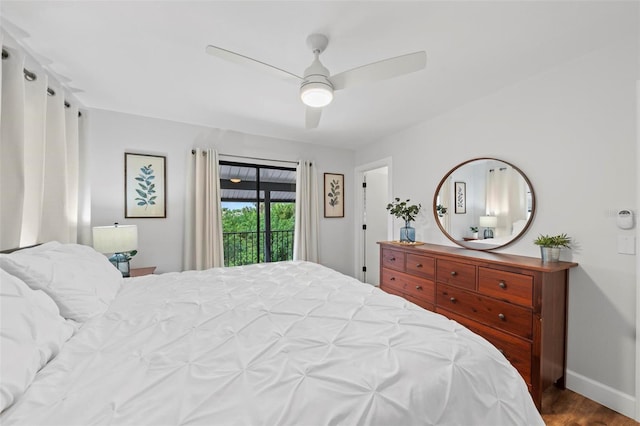 bedroom featuring a ceiling fan, baseboards, access to exterior, and wood finished floors