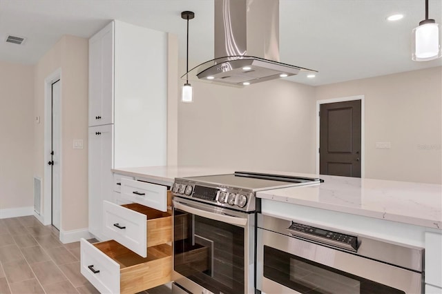 kitchen featuring white cabinetry, island range hood, electric stove, decorative light fixtures, and light stone counters