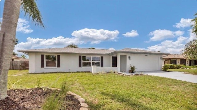 ranch-style house with a front yard and a garage