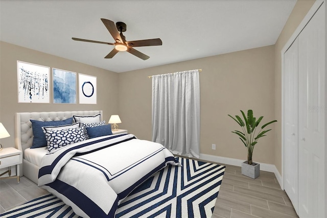 bedroom featuring a closet, ceiling fan, and light wood-type flooring