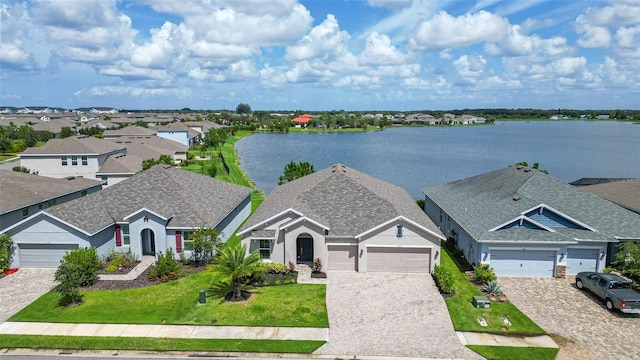 drone / aerial view featuring a water view