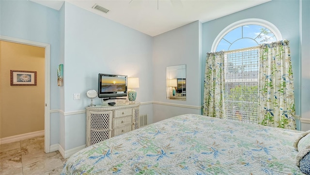 bedroom featuring ceiling fan