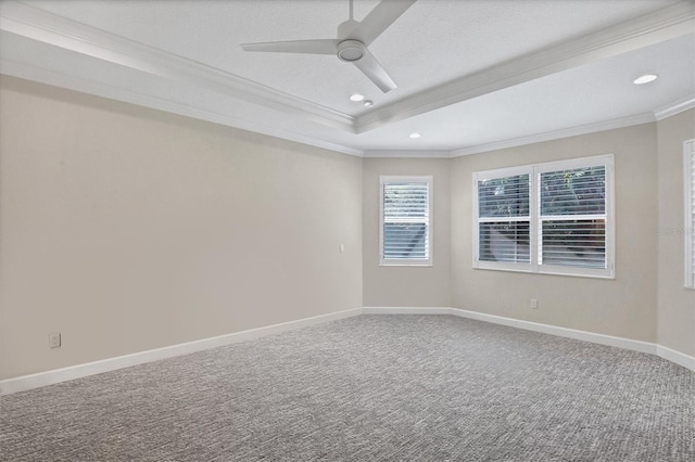 unfurnished room with carpet floors, ceiling fan, and crown molding