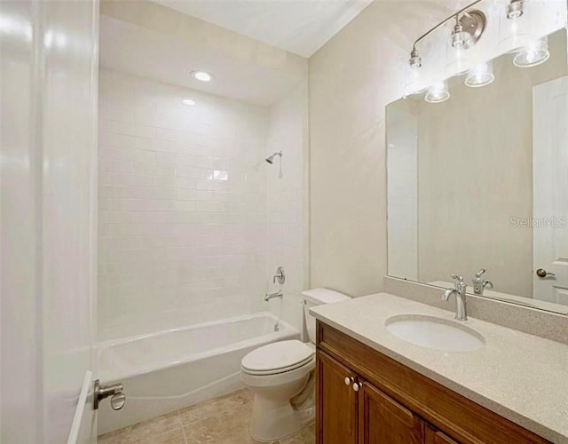 full bathroom featuring tile patterned flooring, vanity, bathing tub / shower combination, and toilet