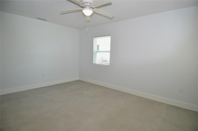 spare room featuring ceiling fan