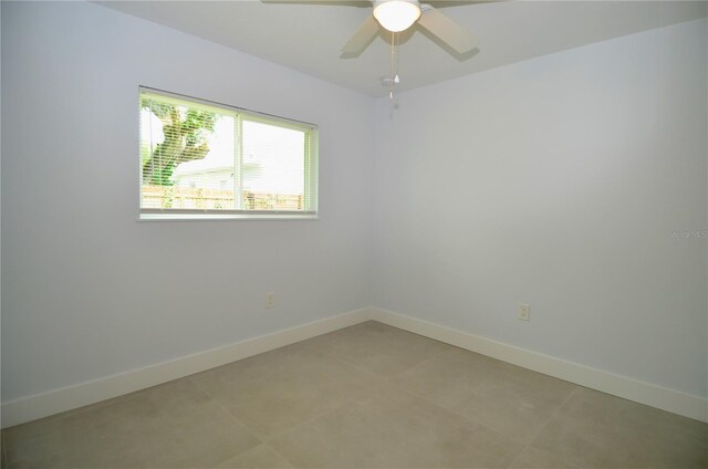 unfurnished room featuring ceiling fan