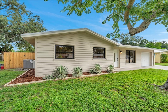 ranch-style home with a front yard