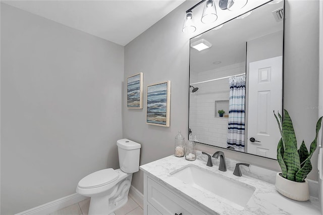 bathroom featuring vanity, toilet, a shower with curtain, and tile patterned floors