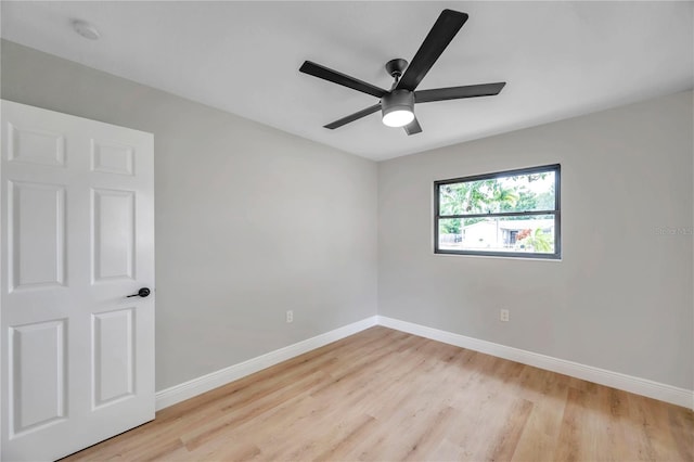 unfurnished room featuring light hardwood / wood-style flooring and ceiling fan