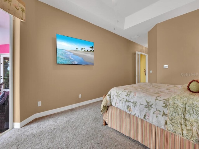 bedroom featuring baseboards and carpet floors