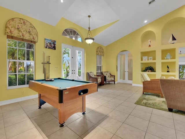 playroom with pool table, baseboards, built in features, light tile patterned floors, and french doors