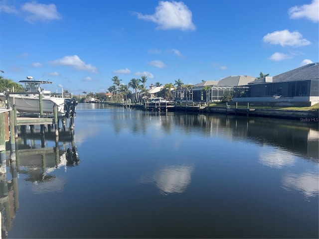 dock area featuring a water view and boat lift