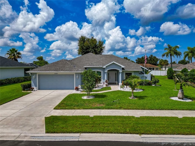 ranch-style house with a front yard and a garage