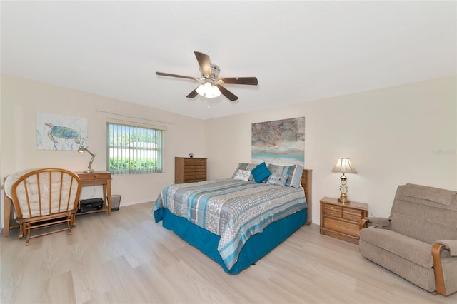 bedroom featuring light hardwood / wood-style flooring and ceiling fan