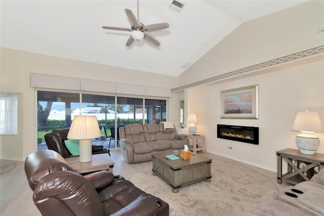 living room featuring light hardwood / wood-style flooring, ceiling fan, and high vaulted ceiling