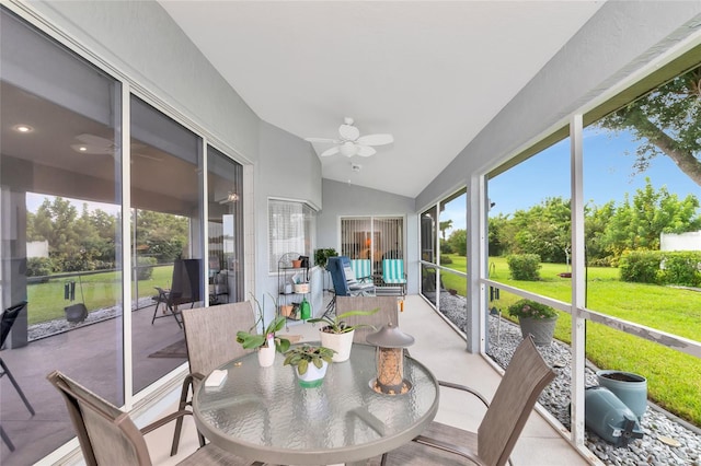 sunroom with lofted ceiling and ceiling fan