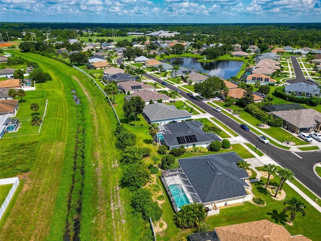 drone / aerial view featuring a water view