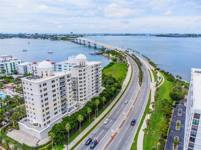 drone / aerial view with a water view and a city view