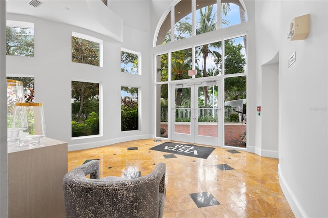 interior space featuring french doors and visible vents