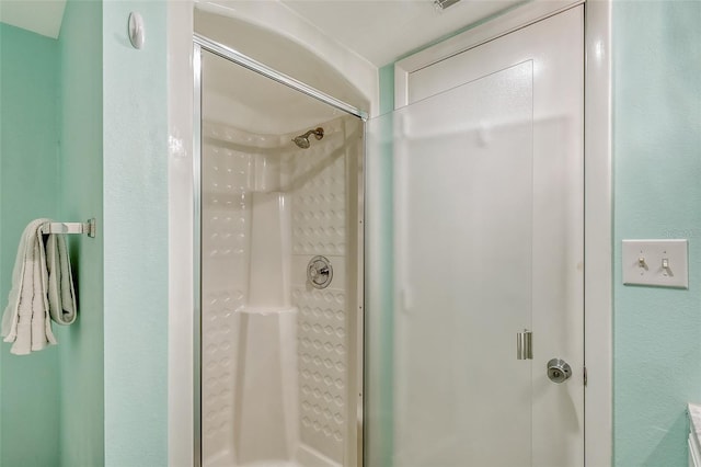 bathroom featuring walk in shower