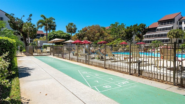 view of community with a swimming pool