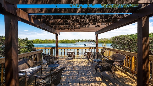 wooden terrace with a water view