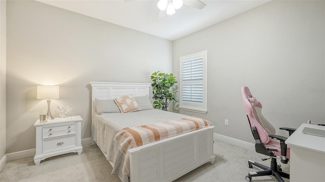 bedroom with light carpet and ceiling fan