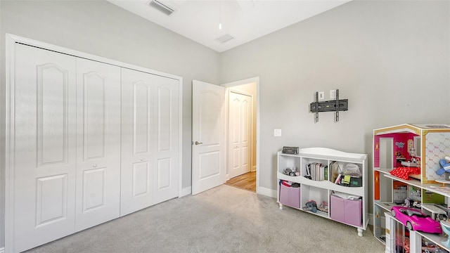 playroom with light colored carpet