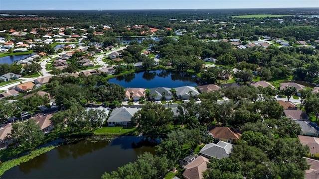 drone / aerial view with a water view