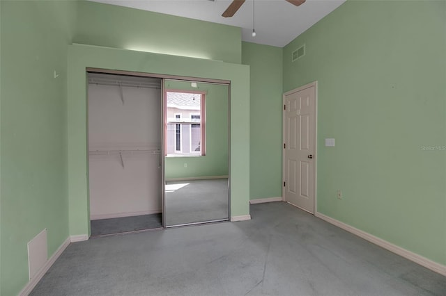 unfurnished bedroom featuring light carpet and ceiling fan