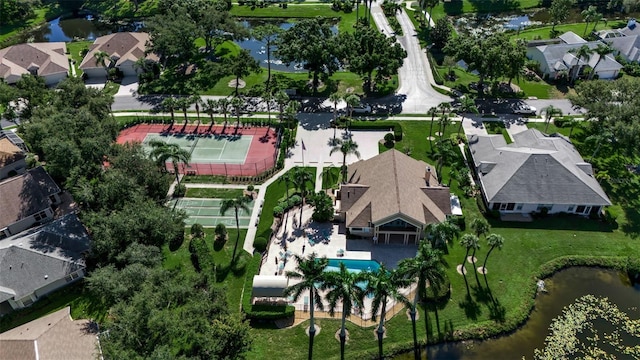 bird's eye view with a water view