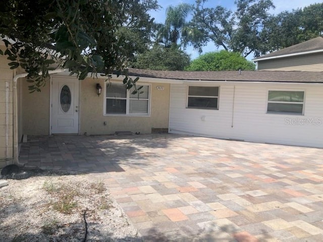 view of front of house featuring a patio