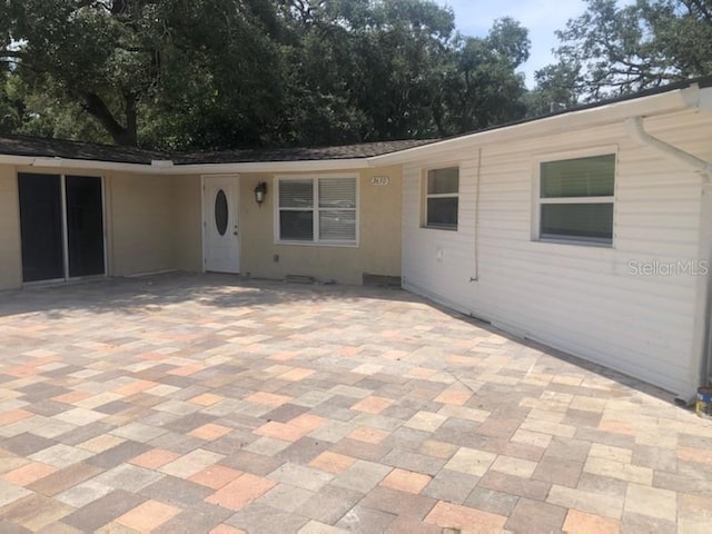 view of front of home with a patio