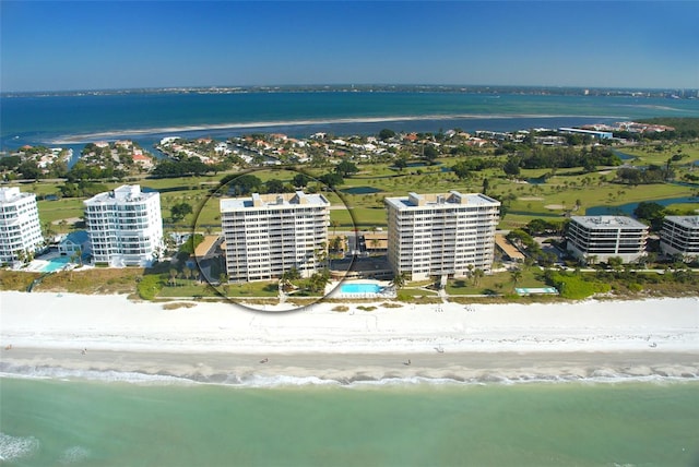 aerial view with a beach view and a water view