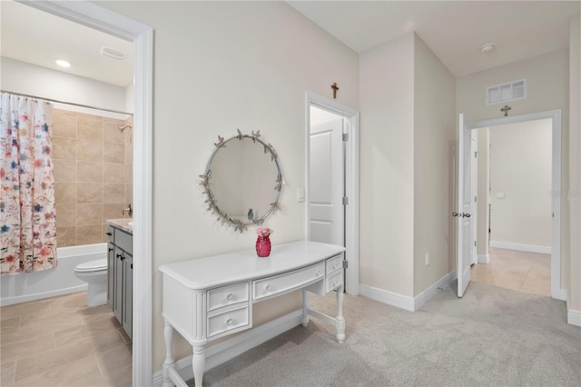 full bathroom with vanity, toilet, and shower / bath combo