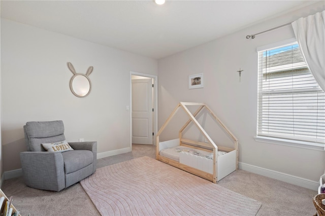 sitting room with light colored carpet