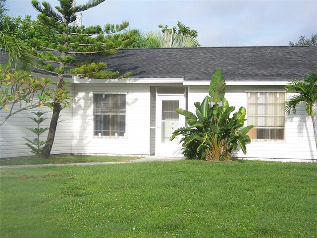 exterior space with a lawn