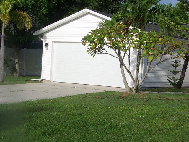 garage with a yard