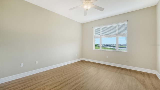 unfurnished room featuring ceiling fan and light hardwood / wood-style floors