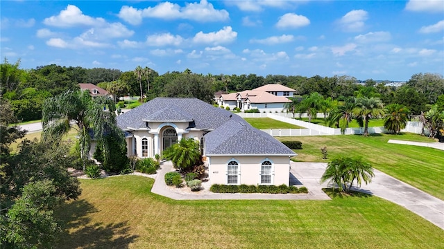 view of front of home featuring a front lawn