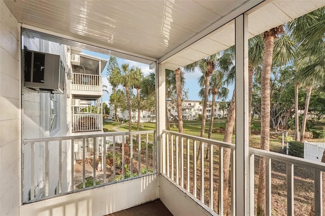 unfurnished sunroom featuring a wealth of natural light