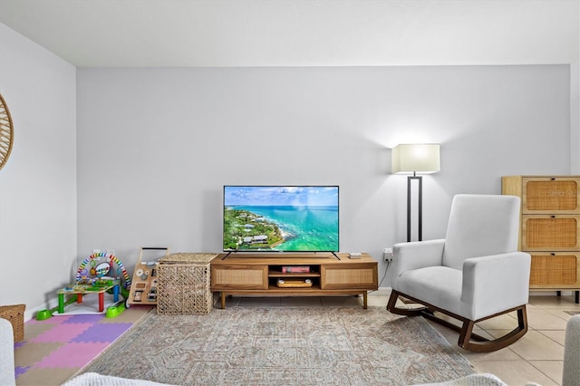 sitting room with light tile patterned floors