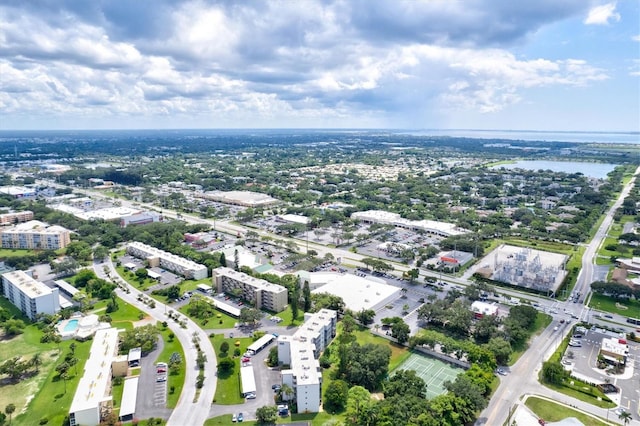 bird's eye view with a water view