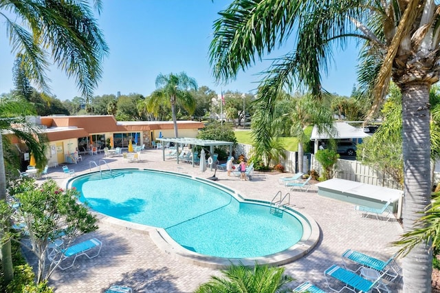 view of pool featuring a patio