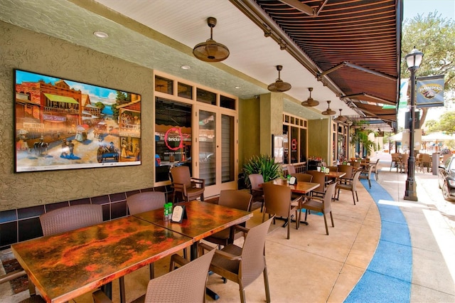 dining space with tile patterned flooring