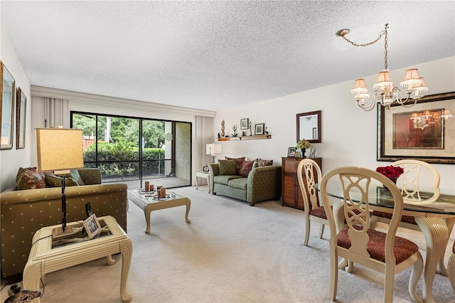 living room featuring a textured ceiling, light colored carpet, and a chandelier